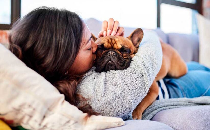 Perro con su dueña